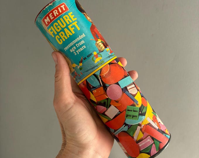 Tube of Merit Figure Craft vintage childhood building toy