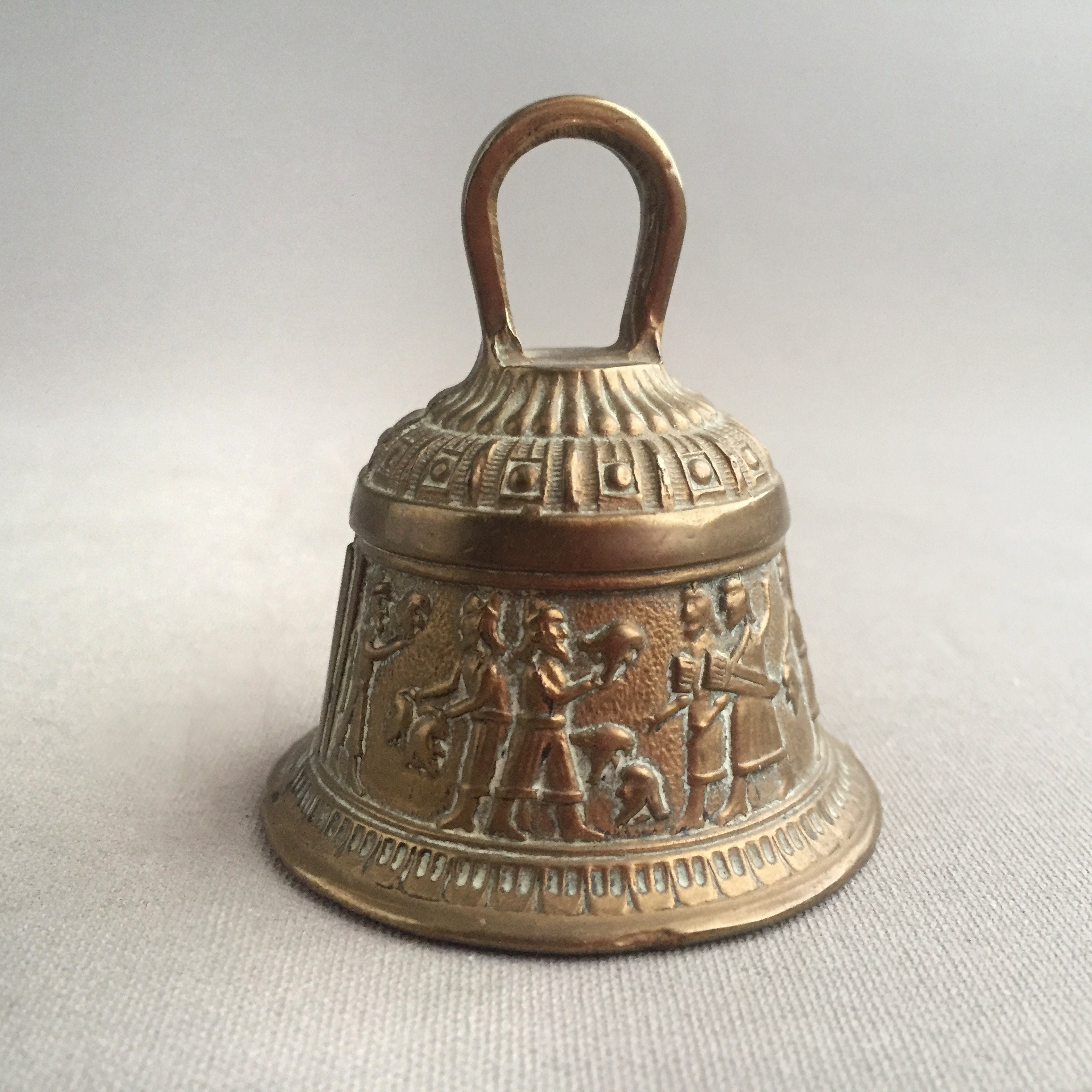 embossed brass bell