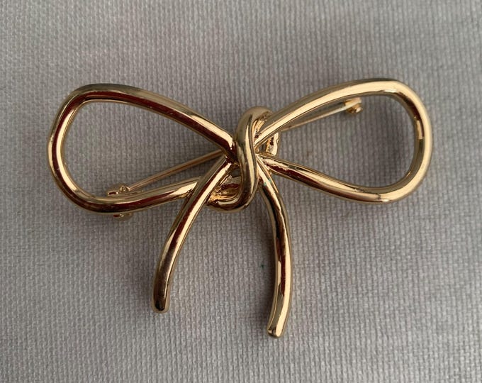costume bow pin brooch