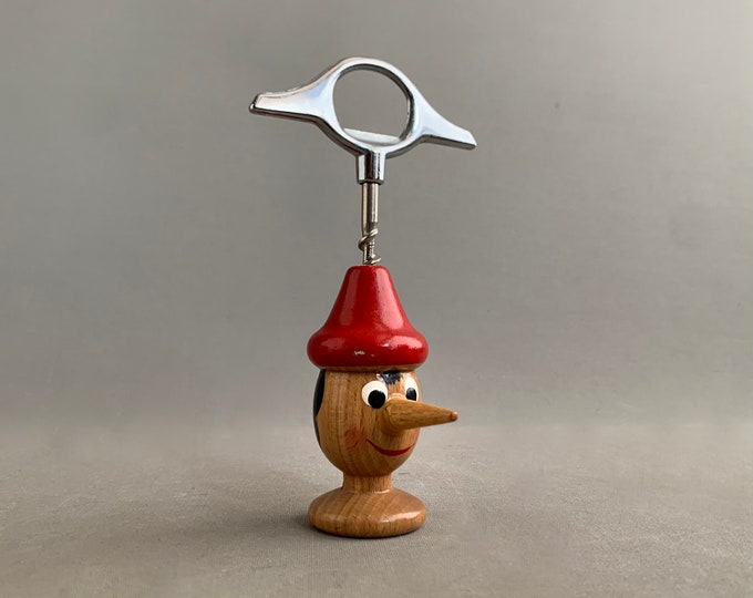 Pinocchio wooden bottle opener and cork screw