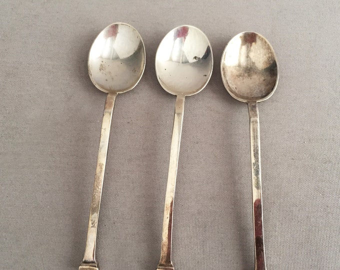3 small silver spoons