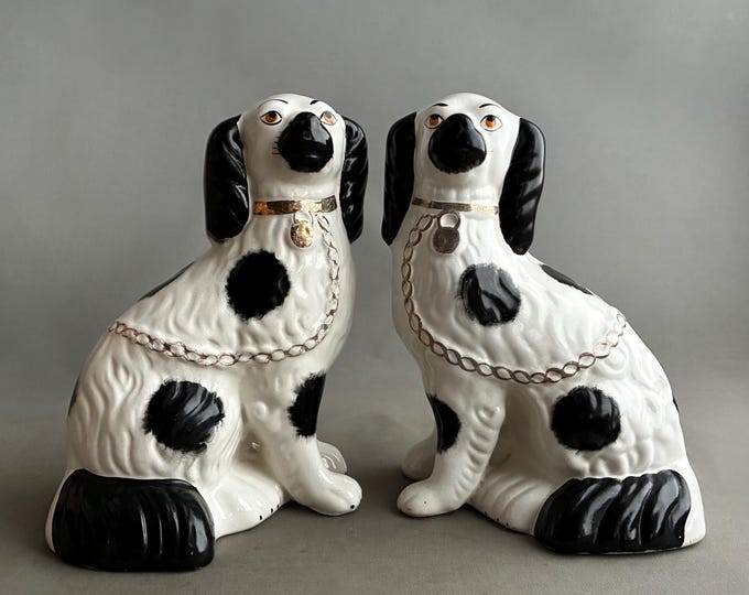 Pair of Staffordshire Hand Painted Black and White Pottery Dog Figurines
