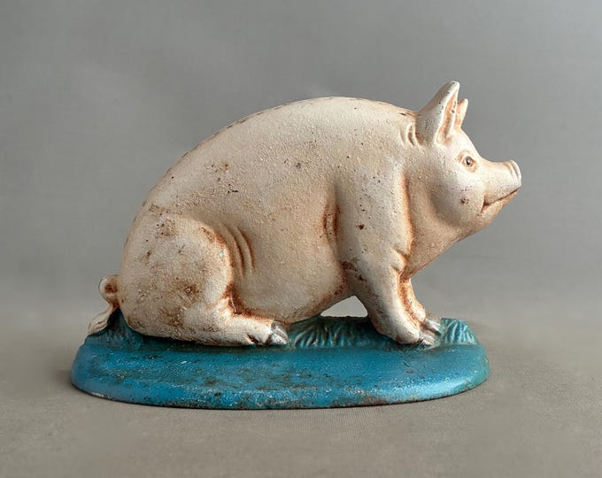 Vintage cast iron pig doorstop