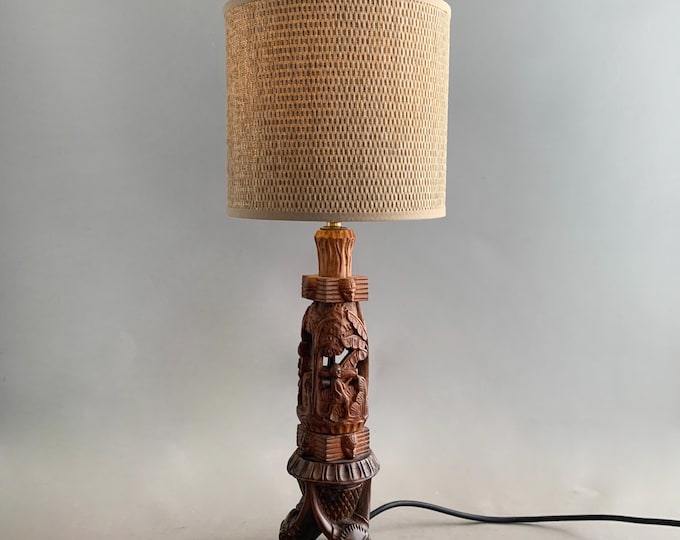 carved wooden tiki lamp