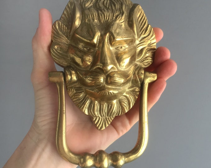 Lion head brass door knocker