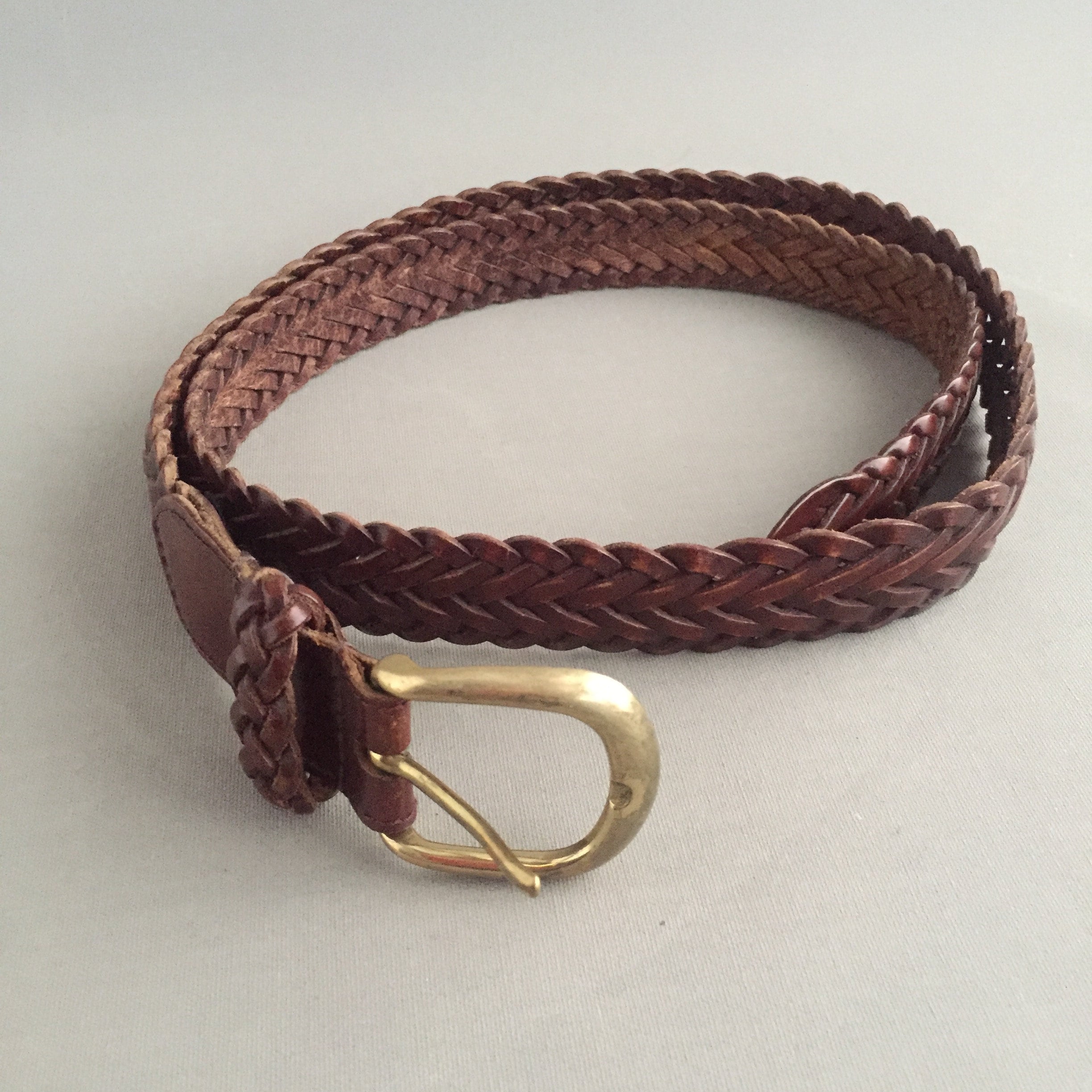 woven leather belt with brass buckle