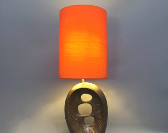 1960s bronzed resin abstract table lamp with silk shade