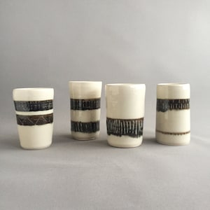 hand made ceramic vessels cups/ vases