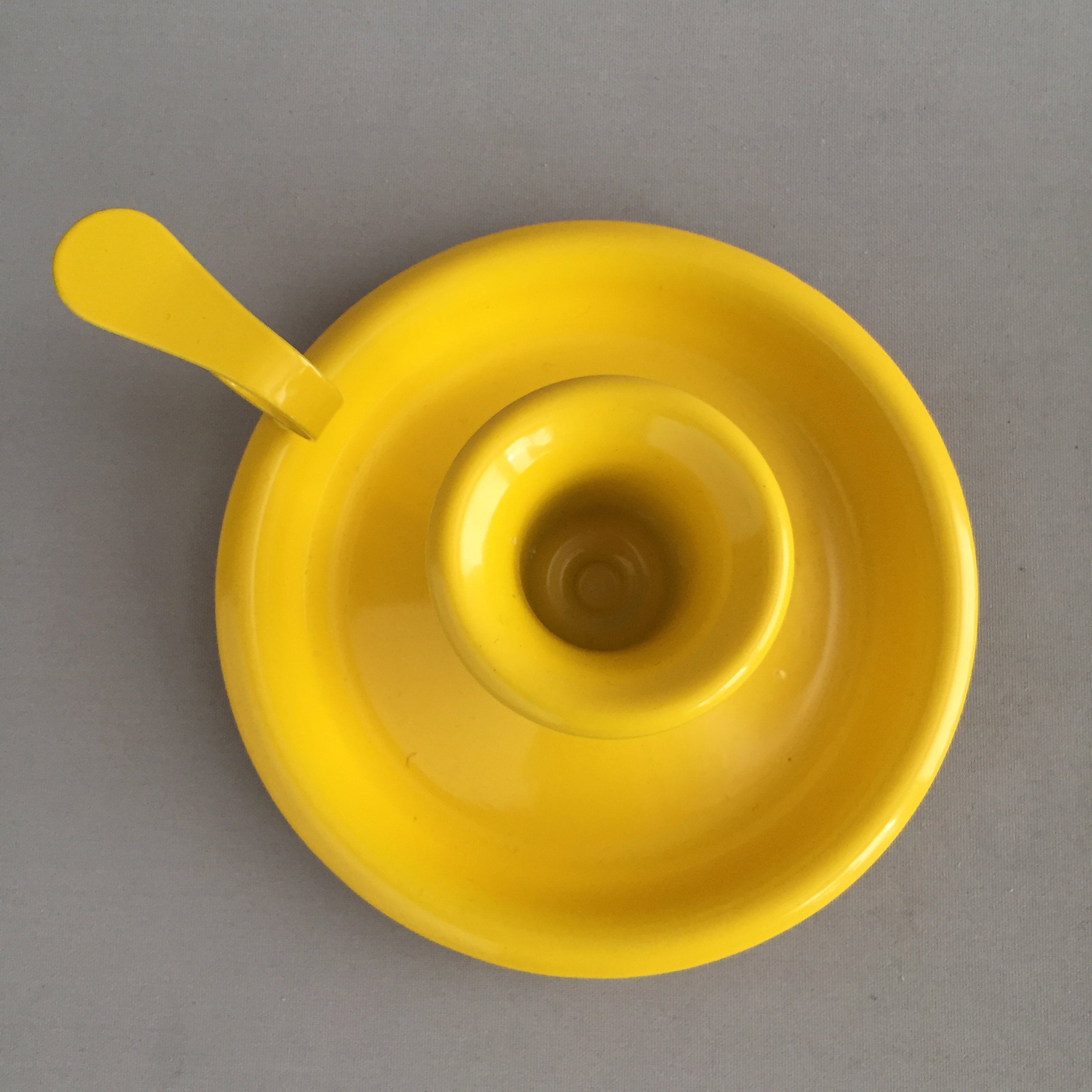 Yellow enamel candlestick holder
