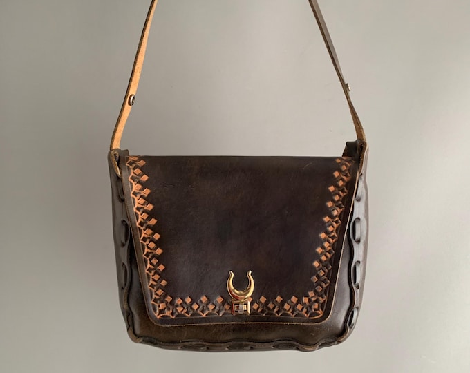 1970s tooled leather saddle bag