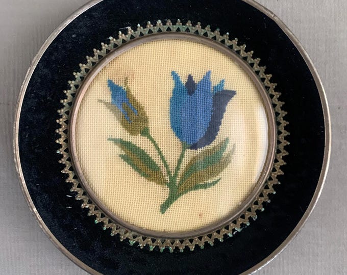 little framed cross stitched flower picture