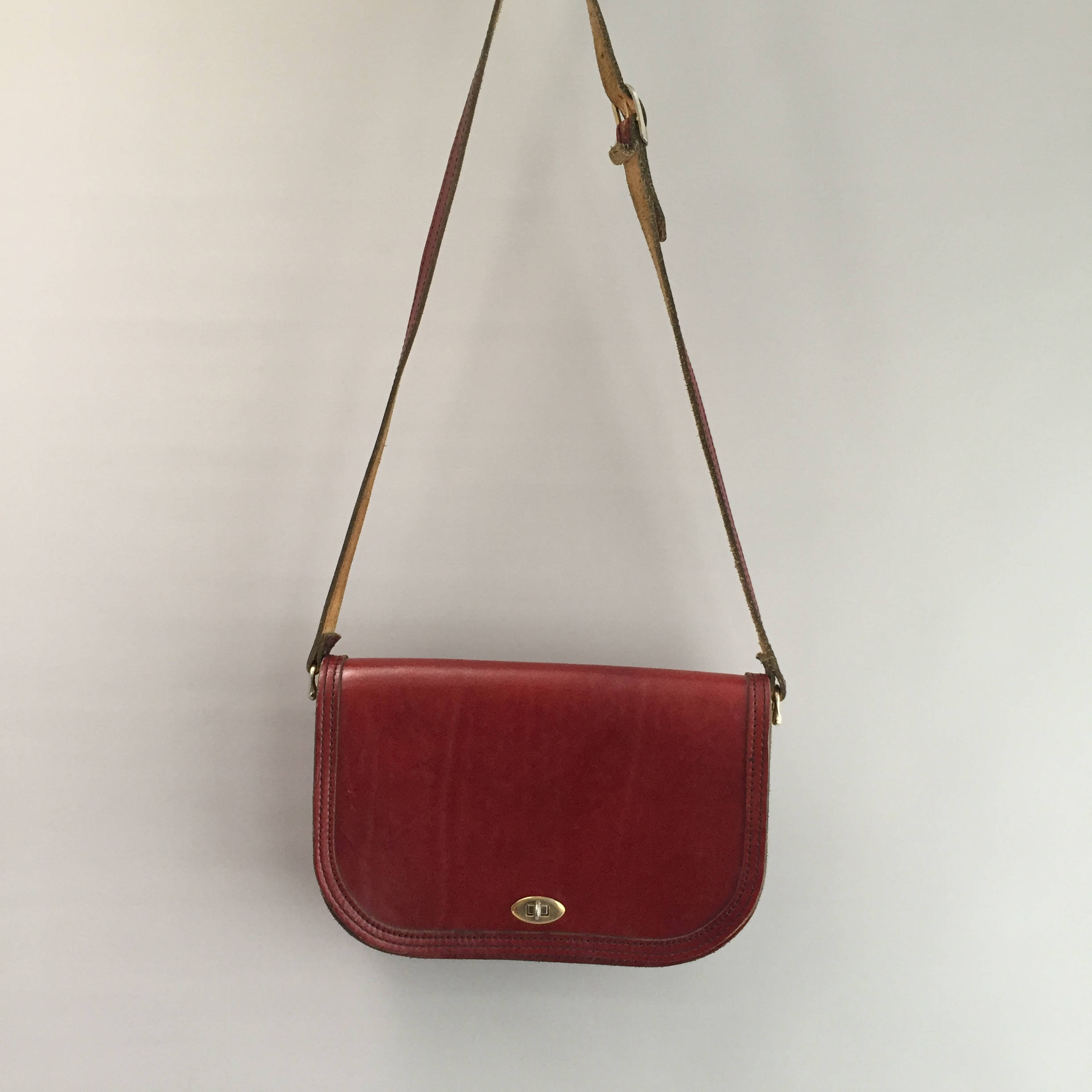 Ox blood Leather cross body saddle bag