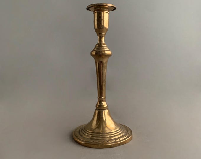 Old brass candle stick holder
