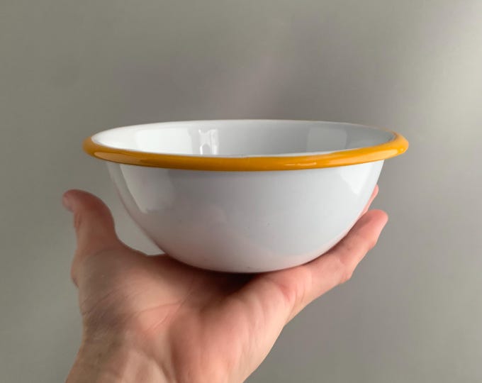 little enamel bowl with yellow rim
