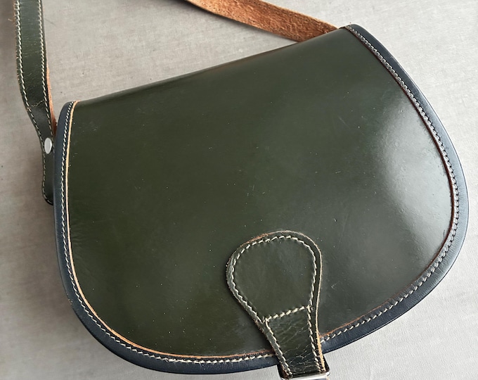 dark green leather saddle bag
