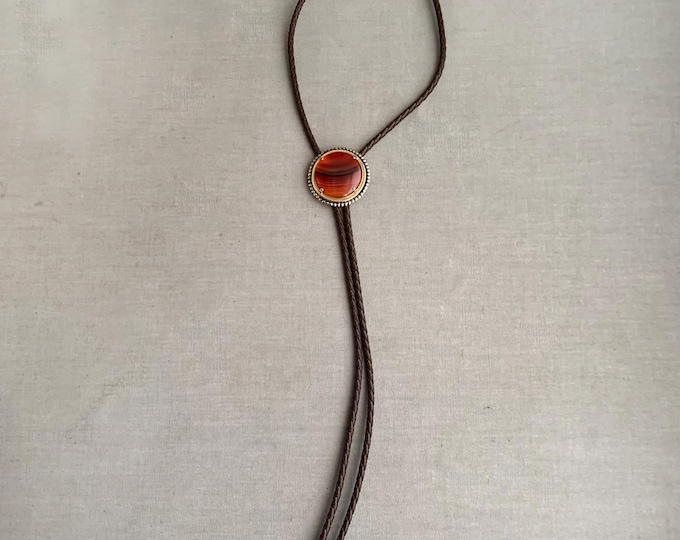 Carnelian Bolo Tie: Brass Base, Woven Leather Cord