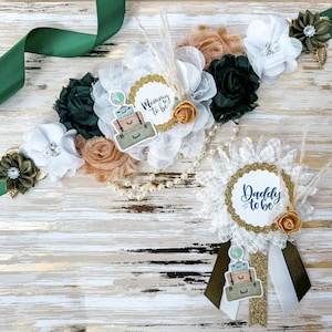La aventura espera el baby shower Mamá será Sash y papá será Pin Set