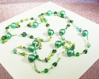 Super long...very green...versatile beaded necklace.