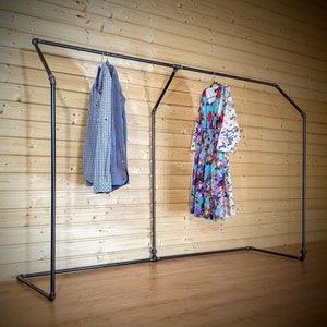 Free standing clothes rack - collapsible clothing rack / retail display