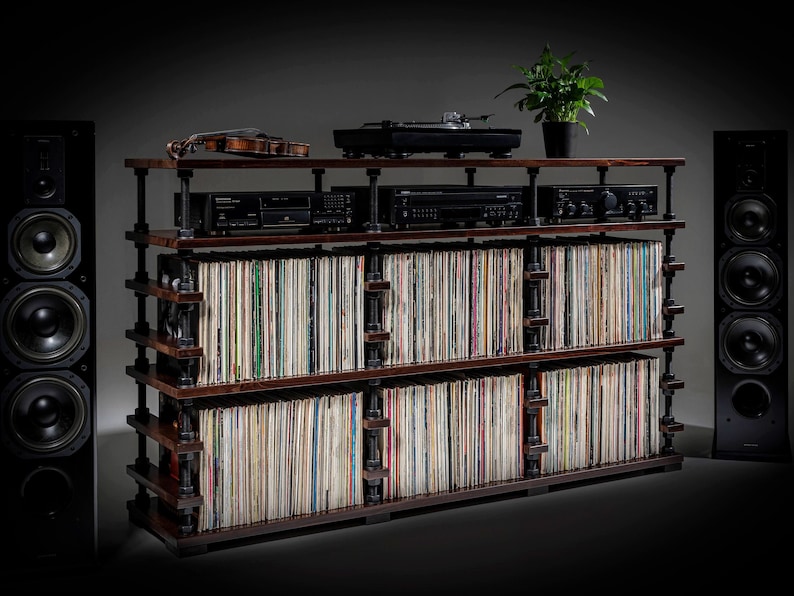 Vinyl records holder with adjustable shelf height.