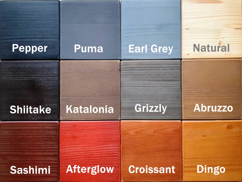 May include: A wood stain color chart with 12 different wood stain colors. The colors are: Pepper, Puma, Earl Grey, Natural, Shiitake, Katalonia, Grizzly, Abruzzo, Sashimi, Afterglow, Croissant, and Dingo.