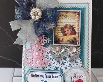 Personaliyed Merry Christmas Card. Silver blue Silent Night card with ribbons, brooch, lace and lots of pearls.