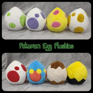 May include: Eight plush Pokemon egg toys in various colours, including white, yellow, blue, and brown, with colourful spots and designs. The text "Pokemon Egg Plushies" is displayed in green. These soft toys are designed to resemble eggs from the popular Pokemon franchise.