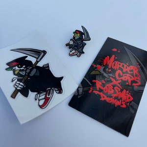 MurderCaps x Rob Smid Design 1.25&quot;  Soft Enamel Hat/Lapel Pin with GITD Features