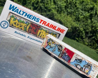 Keep Grinding Graffiti Train Miniture