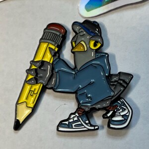 May include: A gray bird wearing a blue hoodie and a blue baseball cap holds a yellow pencil in its right hand. The bird is wearing white sneakers with blue accents.