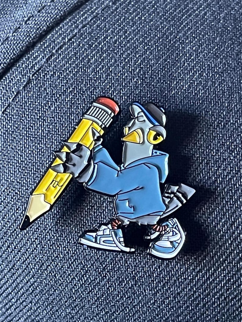 May include: A blue and gray cartoon bird wearing a blue hoodie and a black baseball cap holds a yellow pencil in its hand. The bird is wearing blue and white sneakers.
