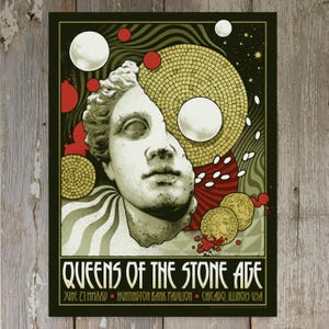 May include: A concert poster for Queens of the Stone Age. The design features a fragmented statue head, a mosaic sun, and red and white abstract shapes. The band's name and concert details are at the bottom.