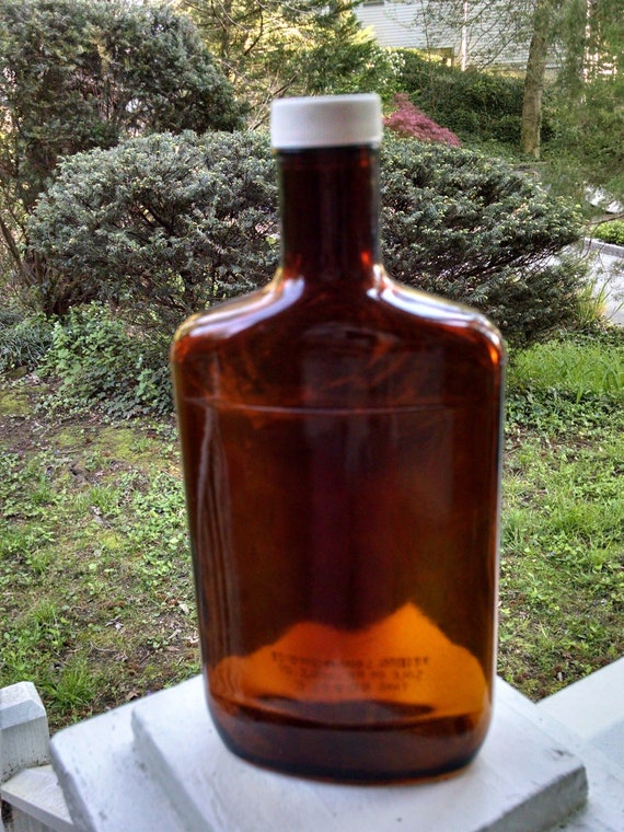 Vintage Kidney shaped flask liquor bottle.