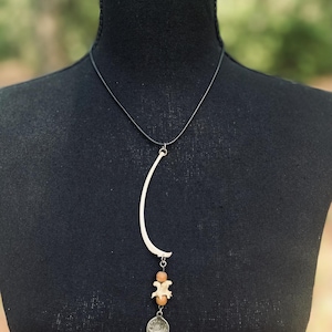 Raccoon rib snake vertebrae coin pendant necklace. bone necklace. gothic necklace. goth bone necklace. unique jewelry. witch jewelry.