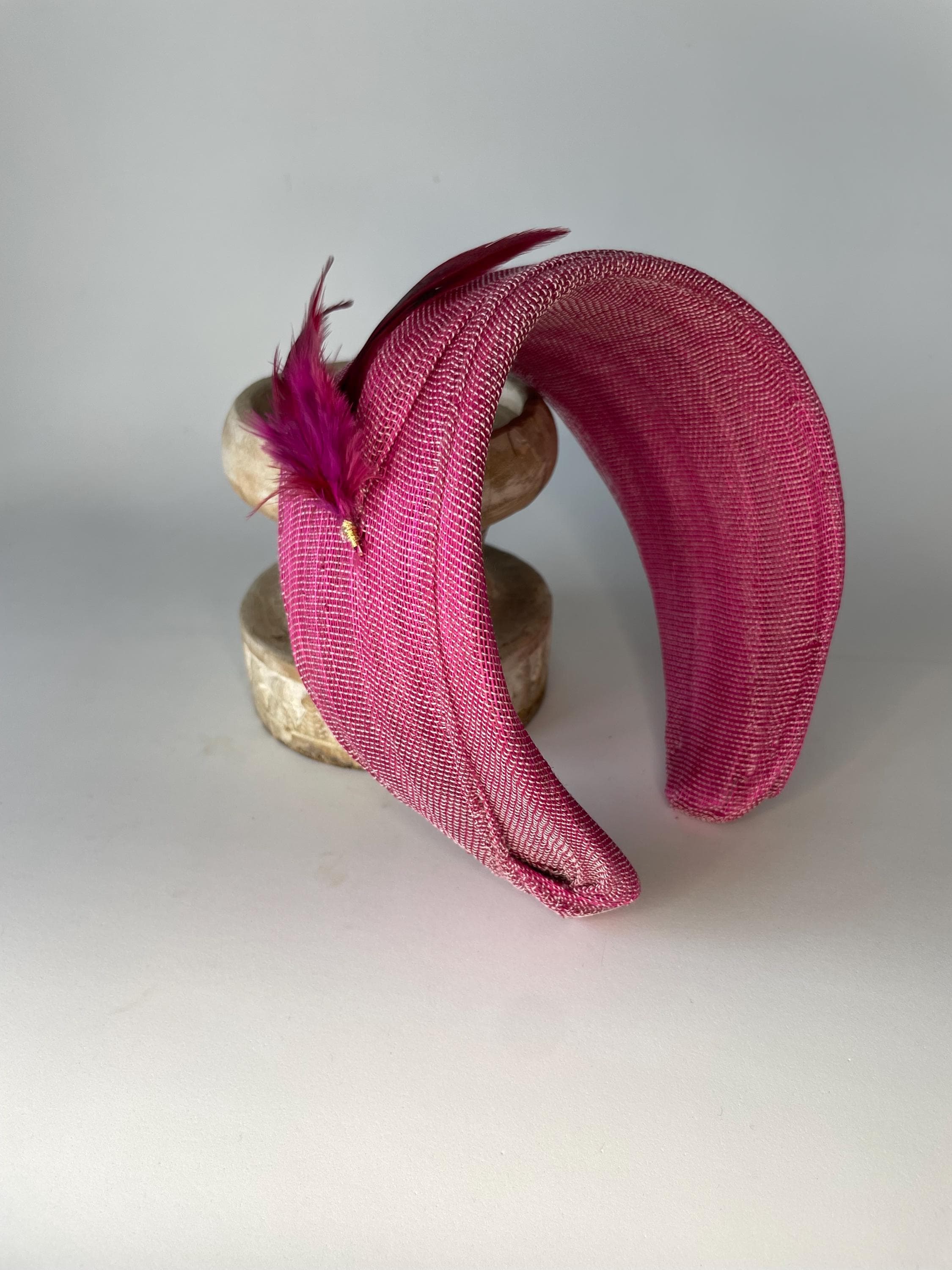 Sinamay headband with feather detail for guests