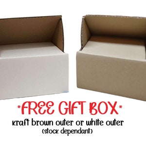May include: Two cardboard boxes, one with a white outer layer and one with a brown outer layer. The text *FREE GIFT BOX* is printed below the boxes. The text kraft brown outer or white outer (stock dependant) is printed below the text *FREE GIFT BOX*.