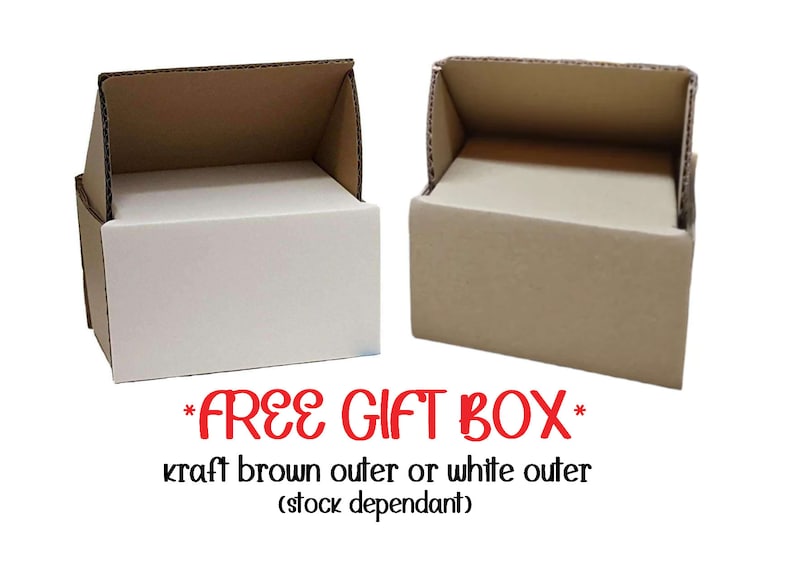 May include: Two cardboard boxes, one with a white outer layer and one with a brown outer layer. The text *FREE GIFT BOX* is printed below the boxes. The text kraft brown outer or white outer (stock dependant) is printed below the text *FREE GIFT BOX*.