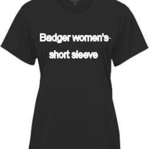 May include: Black short-sleeve t-shirt with white text that reads "Badger women's short sleeve". The shirt has a crew neck and short sleeves. The fabric appears to be a soft, lightweight material.