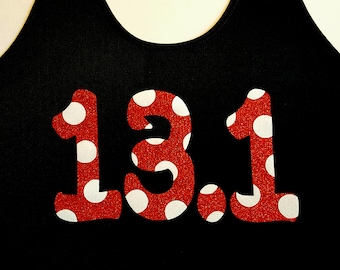 May include: Red tank top with white polka dots and the number 13.1 printed in red.