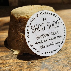 Le "Shoo Shoo, monoï et coco", shampoing solide cheveux très secs à l'huile de coco, huile d'olive, poudre de guimauve et parfumé au monoï