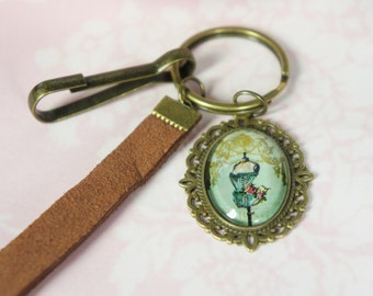 Porte-clé avec cabochon vintage. Un charme vraiment mignon avec un mannequin vintage. Très girly.  Le parfait comme un bijou de Mori. Porte-clé.