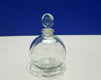worth perfume blue bottle