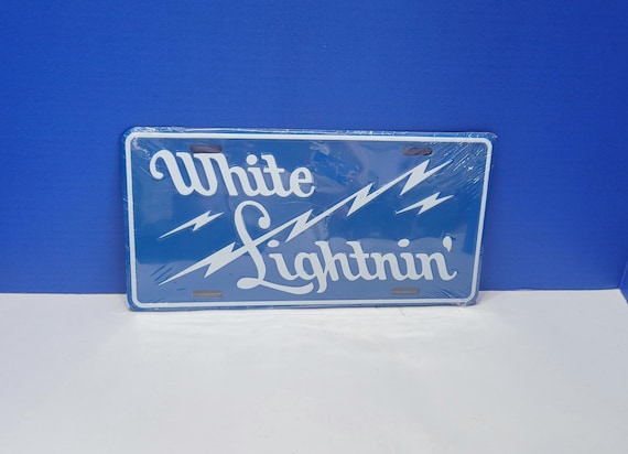 Vintage White Lightnin' Blue and White Metal Sign