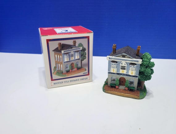 Vintage Liberty Falls Mountain Title Insurance Company Village Figure