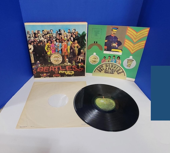 Vintage Sgt Peppers Lonely Hearts Club Band by The Beatles LP Vinyl Record w/ Cutouts