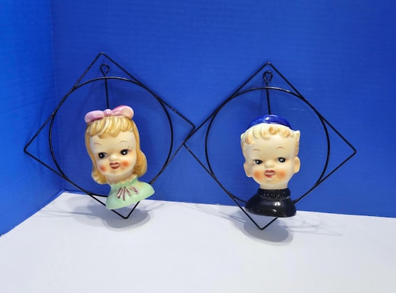 Pair Vintage Ucago Boy and Girl Head Vases on Wire Hangers