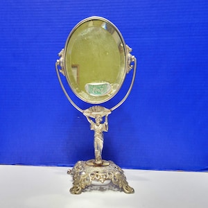 Antique Cast Metal Asian Figural Standing Oval Vanity Mirror