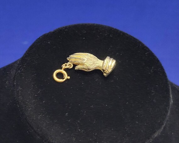 Praying hands charm gold sale