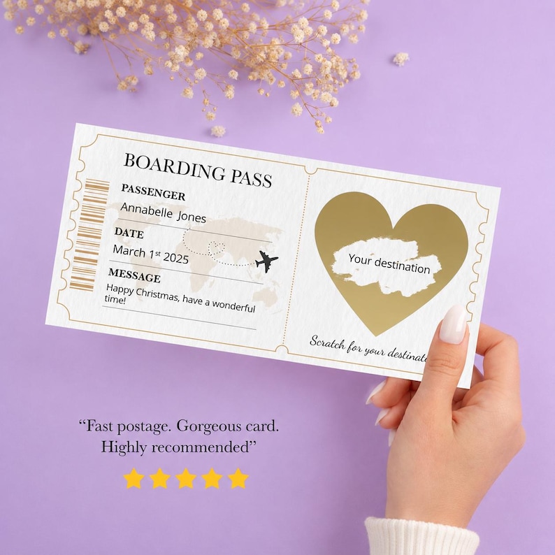 May include: A white boarding pass with gold accents, featuring a heart-shaped scratch-off area. The pass includes the text "BOARDING PASS", passenger details, date, and a message. A small airplane graphic is also present.