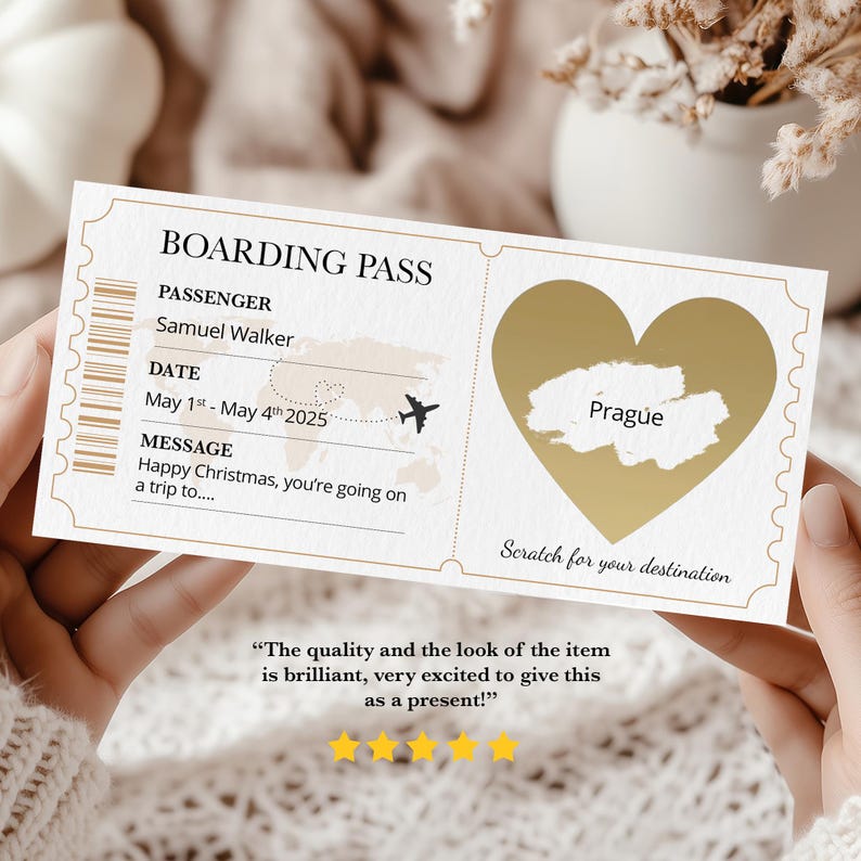 May include: A boarding pass with gold accents and the text "BOARDING PASS". It features a heart-shaped scratch-off area revealing "Prague". The date is May 1st - May 4th, 2025. The message reads "Happy Christmas, you're going on a trip to...."